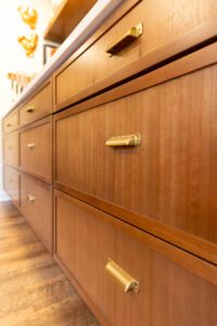 "Kitchen remodel showcasing brown-toned cabinets and thoughtfully designed spaces."